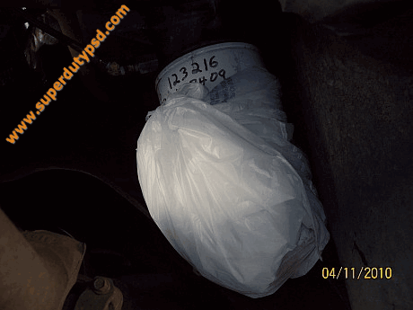 oil filter wrapped in plastic bag